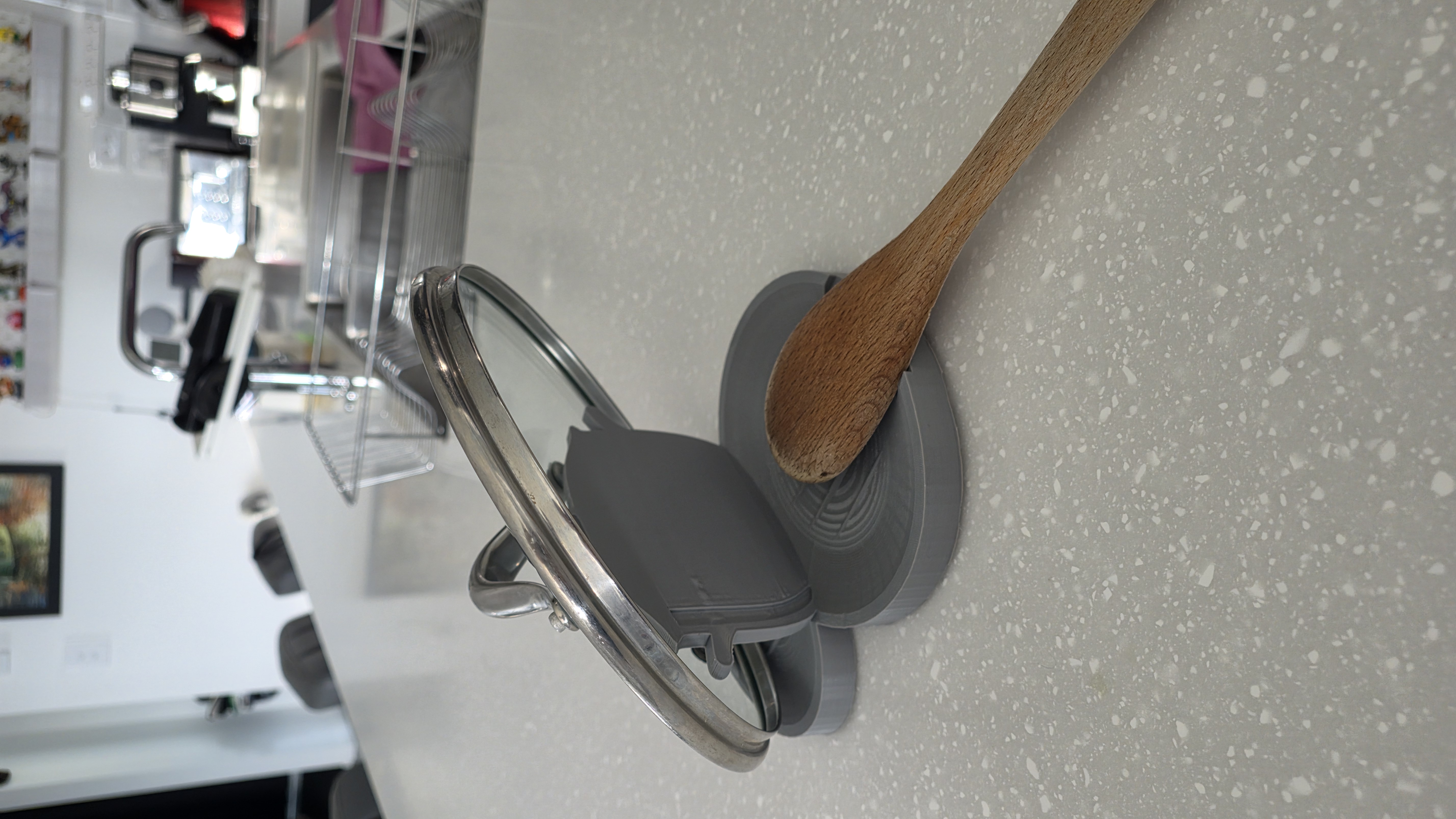 The printed rest shown with a lid and spoon.